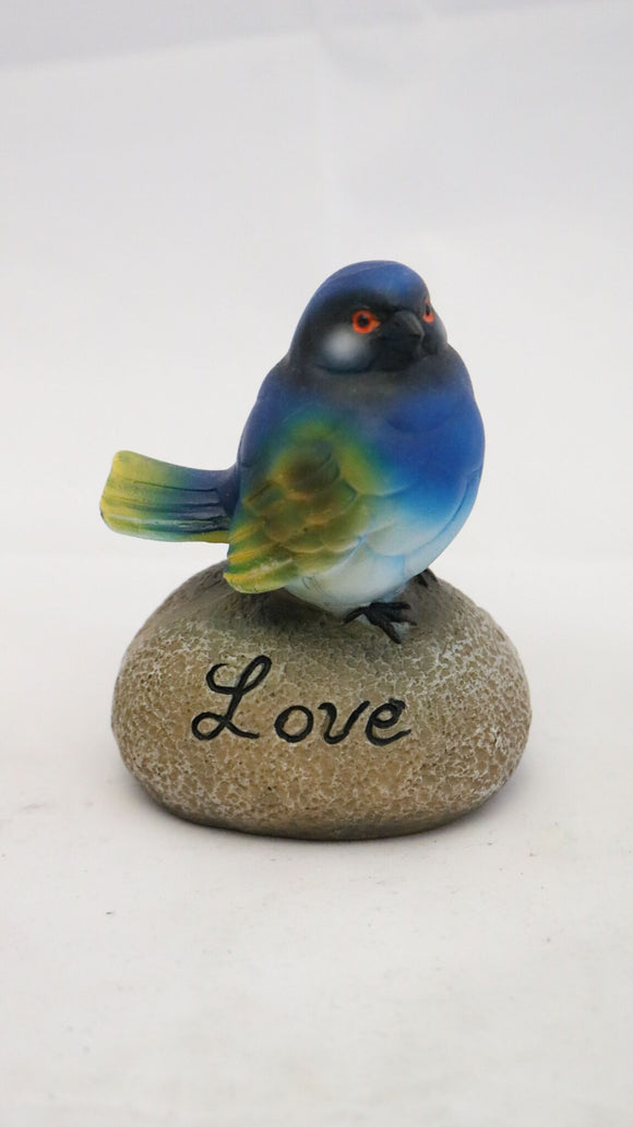 Inspirational Blue Bird Sitting on a Rock with the Word Love