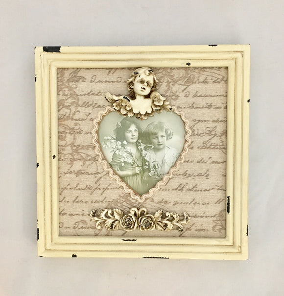 Vintage Look square frame with material and cherub decoration